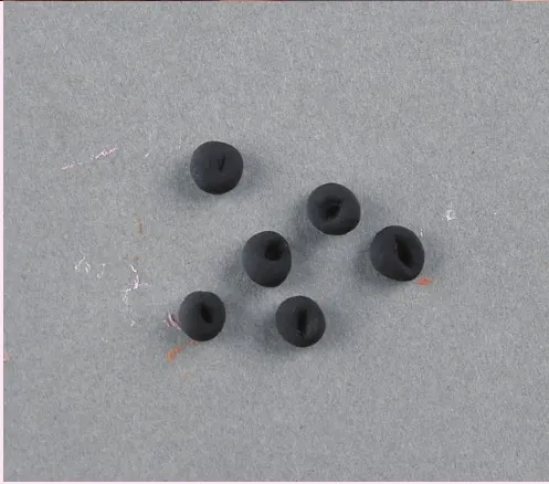 Black olives made from air-dried clay