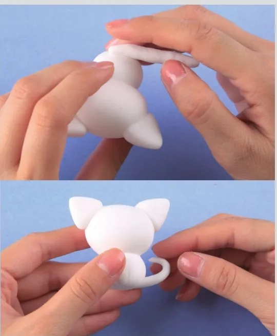 Make the clay cat’s tail more realistic